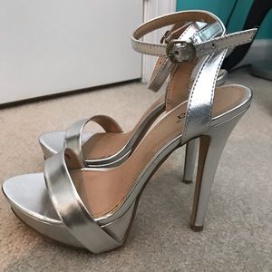Silver platform heel. Strappy heels.